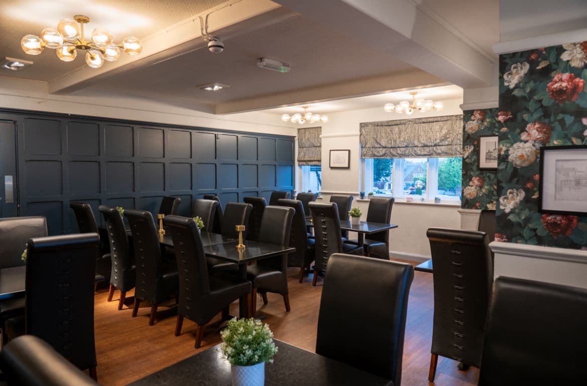 The dining room with navy panelling